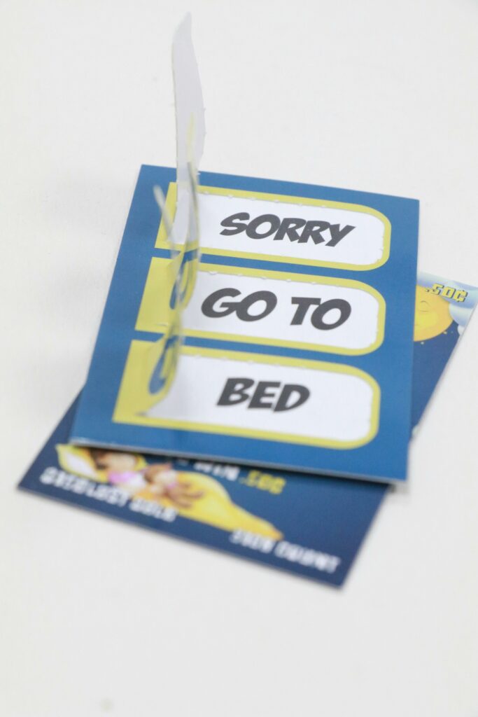 Bilde av skrapelodd med teksten "gå i seng"